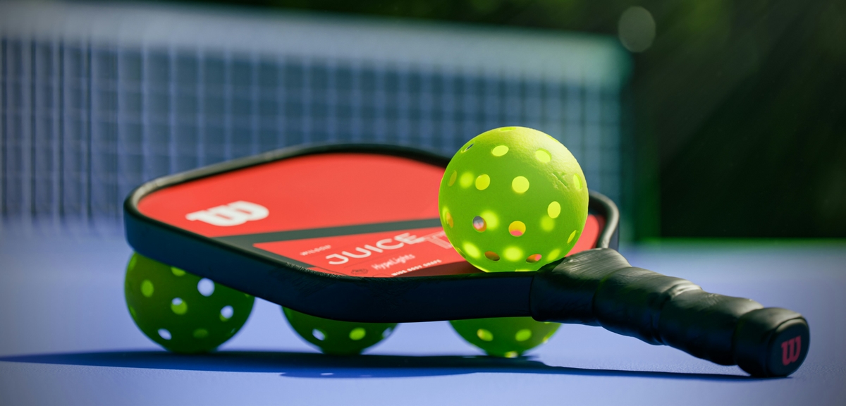 Échange au filet pendant une partie de Pic​kleball